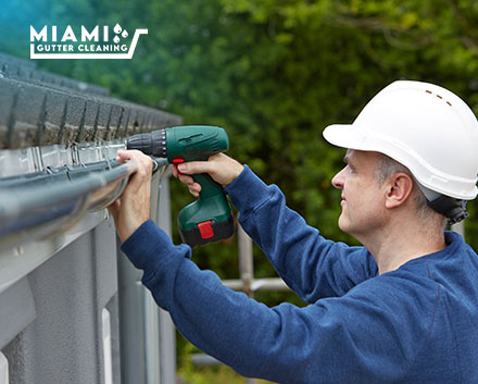 Gutter Installer Replacing a Gutter