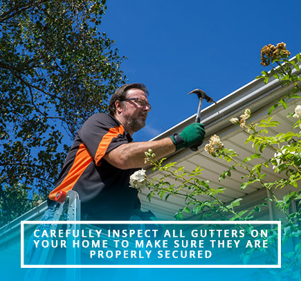 Man Preparing Your Gutters for Hurricane Season