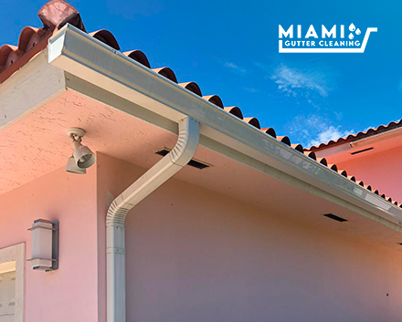 A Professionally Installed Gutter System That Withstands Heavy Rain in a Residential Area